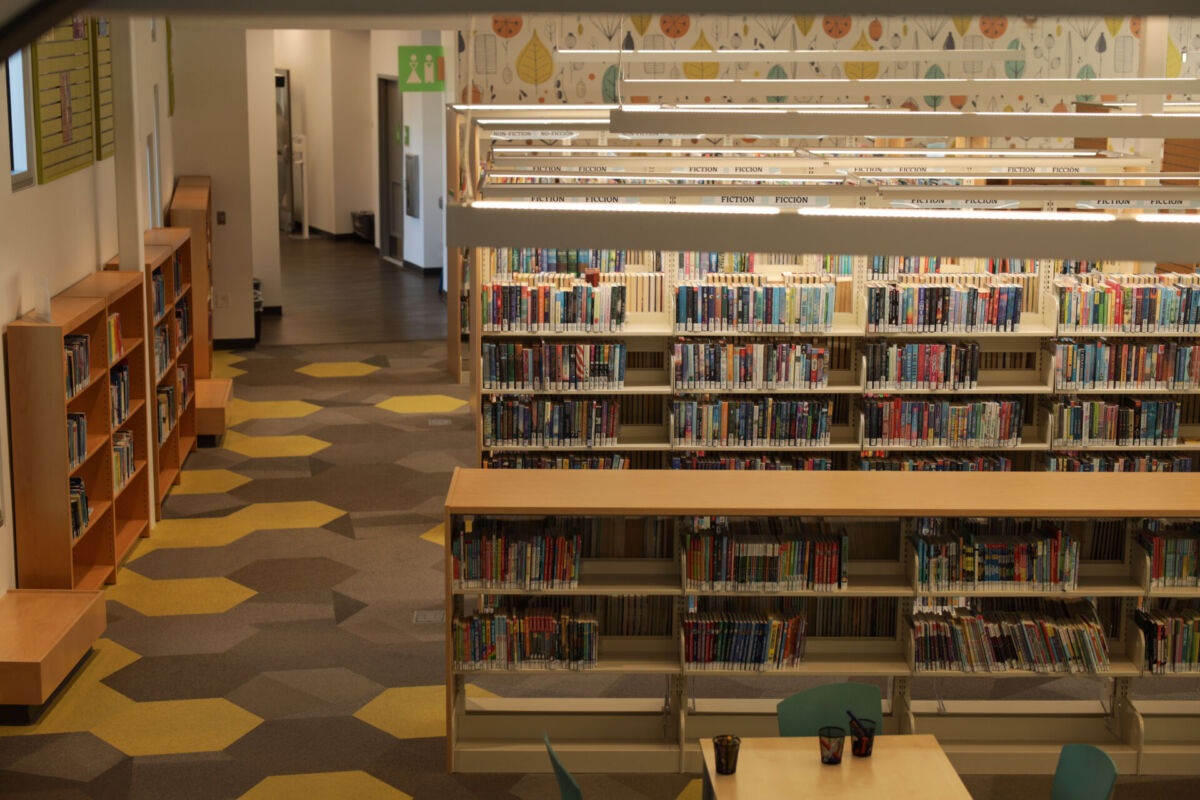 OPTERRA book donation to Mountain View Whisman School District libraries to support student learning.