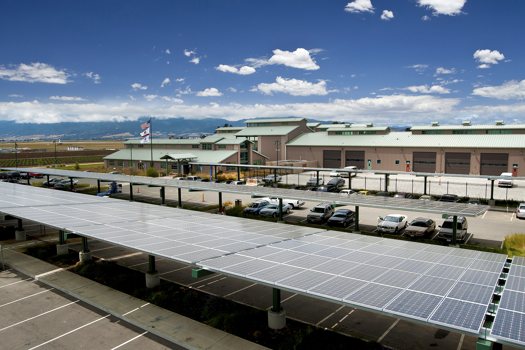 Solar parking canopies at Hartnell College generate renewable energy while shading vehicles, supporting campus sustainability goals through OPTERRA-delivered infrastructure upgrades.
